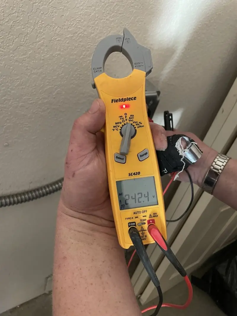 Voltage testing with clamp meter during Generator Installation in Royal Oak